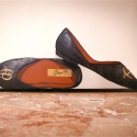 These elegant trompe l'oeil slippers were rendered with the client's monogram.