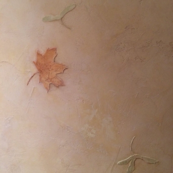 Venetian plaster and bas-relief leaves.