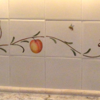 Hand-painted kitchen tiles.
