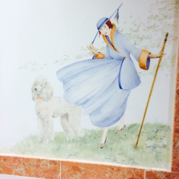 Lady and Poodle mural in a restroom.