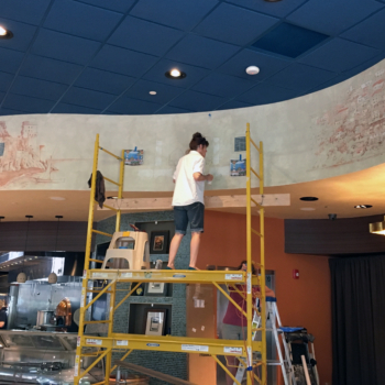 Jennifer at work on the mural