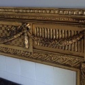 A fireplace mantle at the magnificent Hoffstott mansion on Fifth Ave. in Pittsburgh was in need of TLC. Here are before-and-after shots of the mantle piece gilded and glazed to maintain it's distinguished, aged looked.